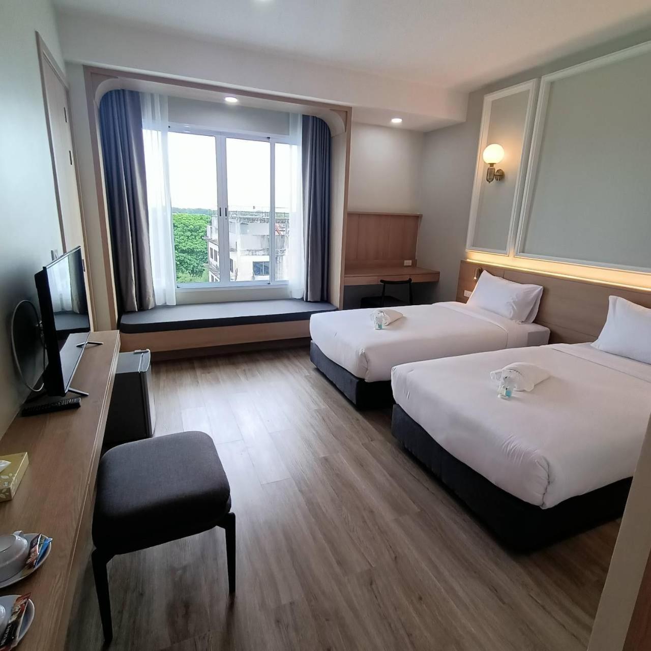 Mayflower Grande Suite Hotel Пхитсанулок Экстерьер фото